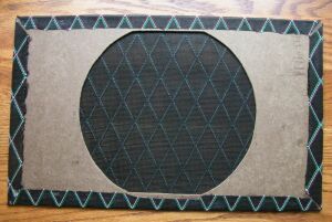 Cloth glued to support template - back view