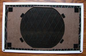 Back of grill with mounting velcro attached
