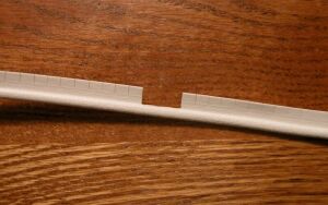 Piping showing notch removed from mounting flange